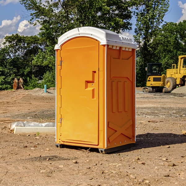 what is the cost difference between standard and deluxe porta potty rentals in Russell IL